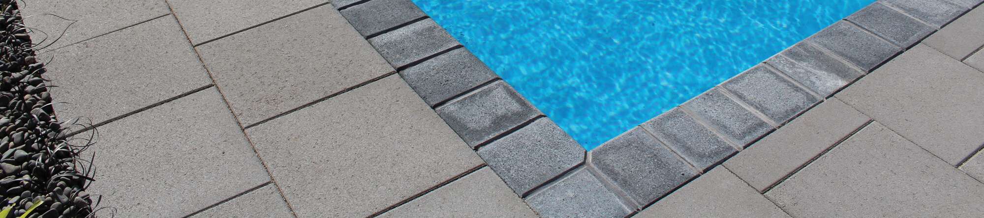 Flagstone paver swimming pool surround